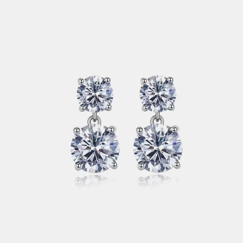 Silver double-drop cubic zirconia stud earrings with two round-cut stones.