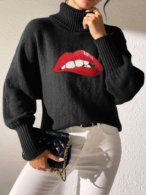 Black turtleneck sweater with sequin red lips detail and balloon sleeves.