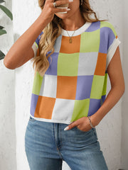 Checkerboard knit cap sleeve top in blue purple, orange, lime green, and white.