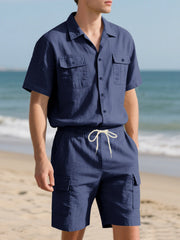 Navy blue relaxed-fit button-up shirt and drawstring shorts set with cargo pockets.