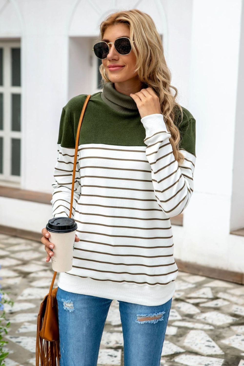 Colorblock stripe turtleneck knit sweater with army green, white, and brown stripes.