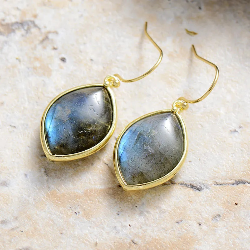 Cosmic Quartz Droplet Earrings with gold setting and iridescent blue-grey stones.