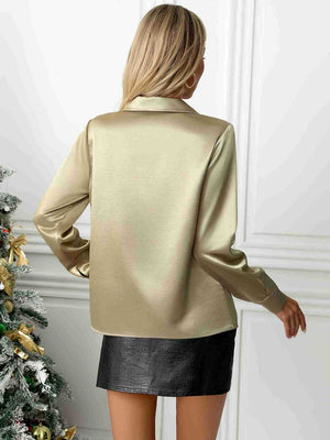 Gold satin button-down blouse with long sleeves and a classic collar.