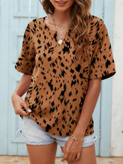 Brown dalmatian print relaxed notch neck top with short sleeves.
