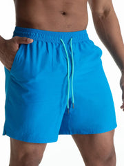 Sky blue boardshorts with contrast drawstring and elastic waistband.