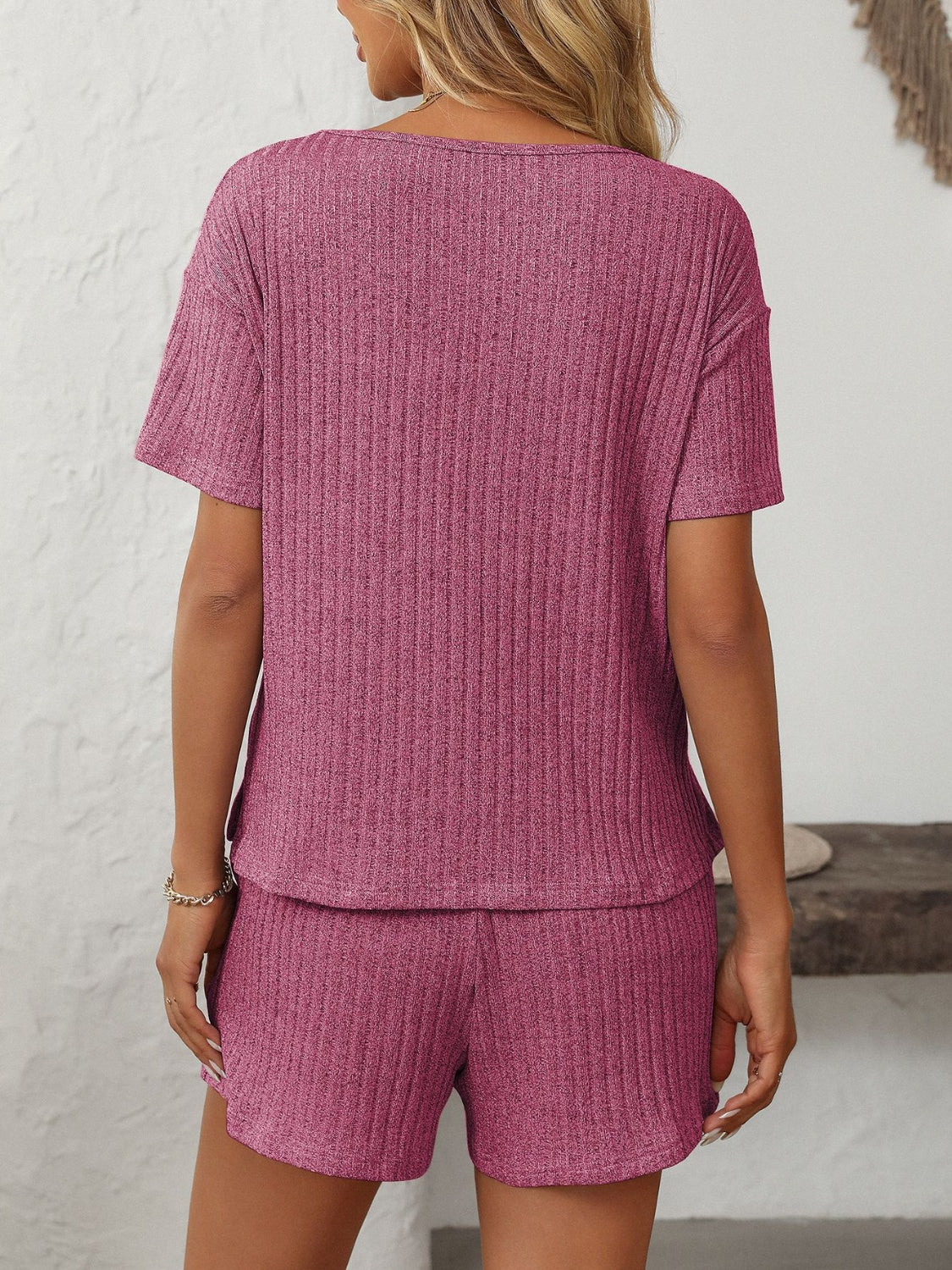 Ribbed V-neck loungewear set in Red-Violet, featuring a short-sleeve top and matching shorts.
