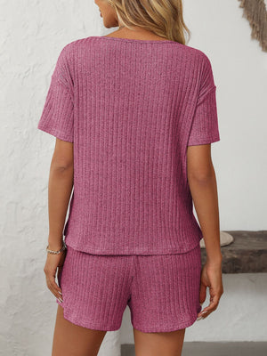Ribbed V-neck loungewear set in Red-Violet, featuring a short-sleeve top and matching shorts.