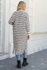 Multi color crochet maxi cardigan with fringe detail and plaid pattern.