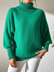 Dark Green balloon sleeve turtleneck sweater with ribbed cuffs and collar.