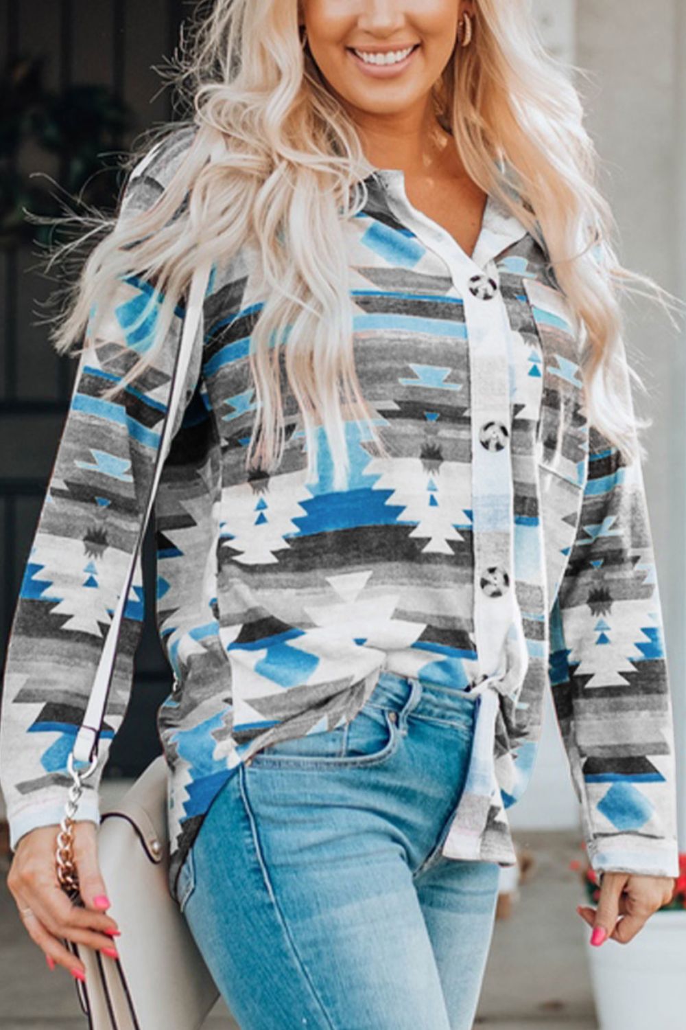 Southwestern print button-down blouse in multicolor with a tie waist and button details.