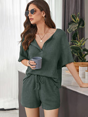 Army green waffle knit henley short set with drawstring shorts and v-neck top.