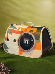 Charming bubble window pet carrier bag with abstract geometric pattern and amber tint.