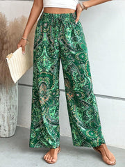 Paisley palazzo trousers in Dark Green with drawstring waist and wide leg.