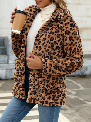Leopard print sherpa overshirt jacket with button front and pockets.