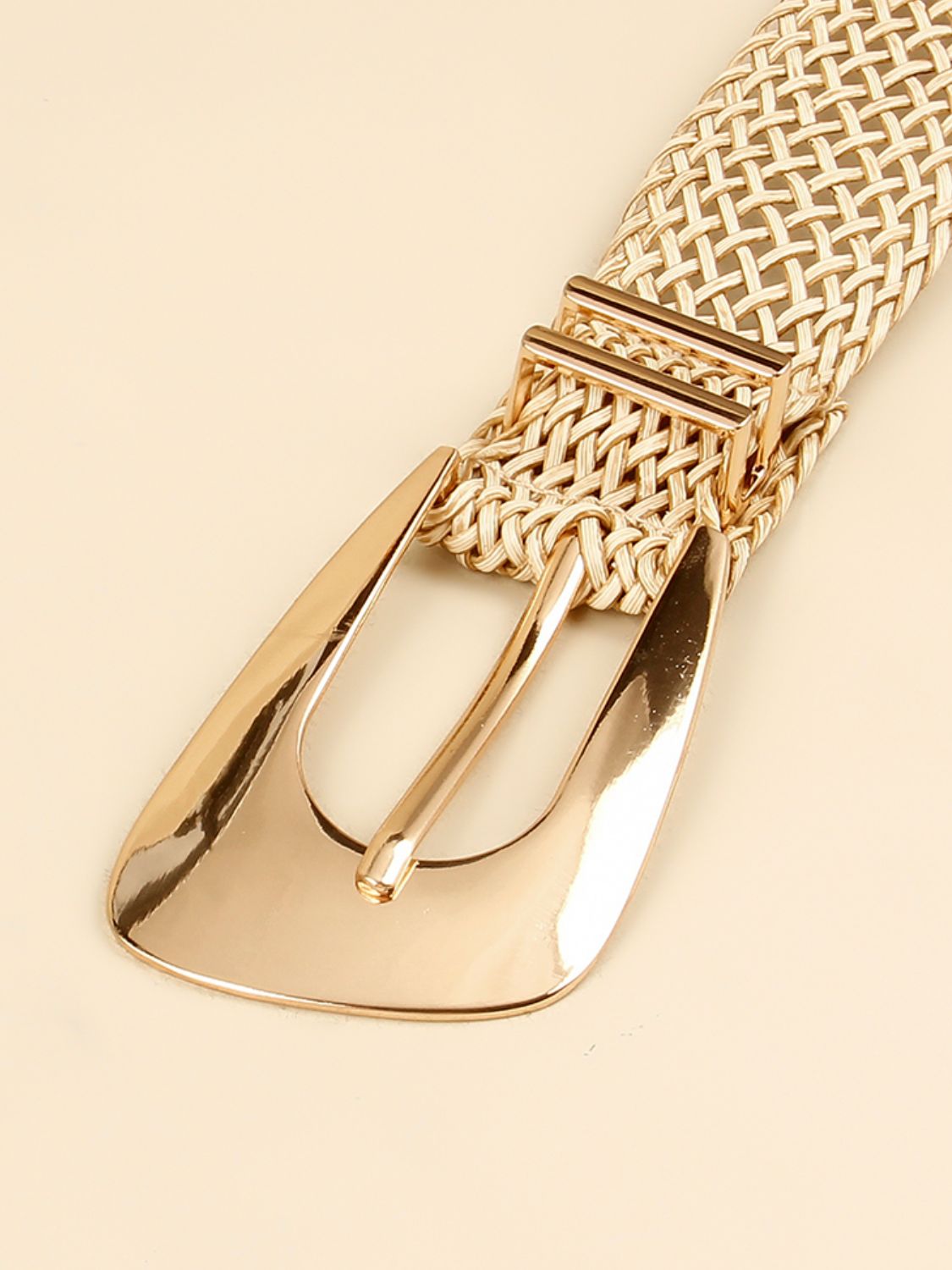 Woven raffia belt in camel with a gold-tone buckle and double keepers.