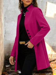 Chic longline trench coat in Deep Rose with button-down front and collarless neckline.