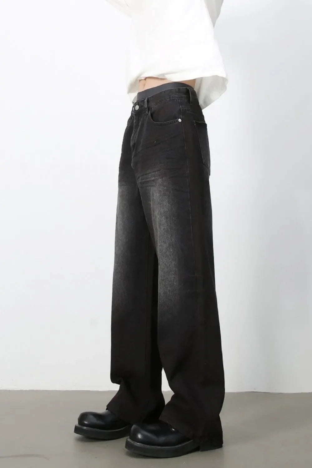 Faded dark wide-leg denim jeans with a casual fit.