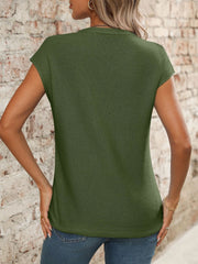 Moss green seamed knit sleeveless v-neck top with a textured knit.