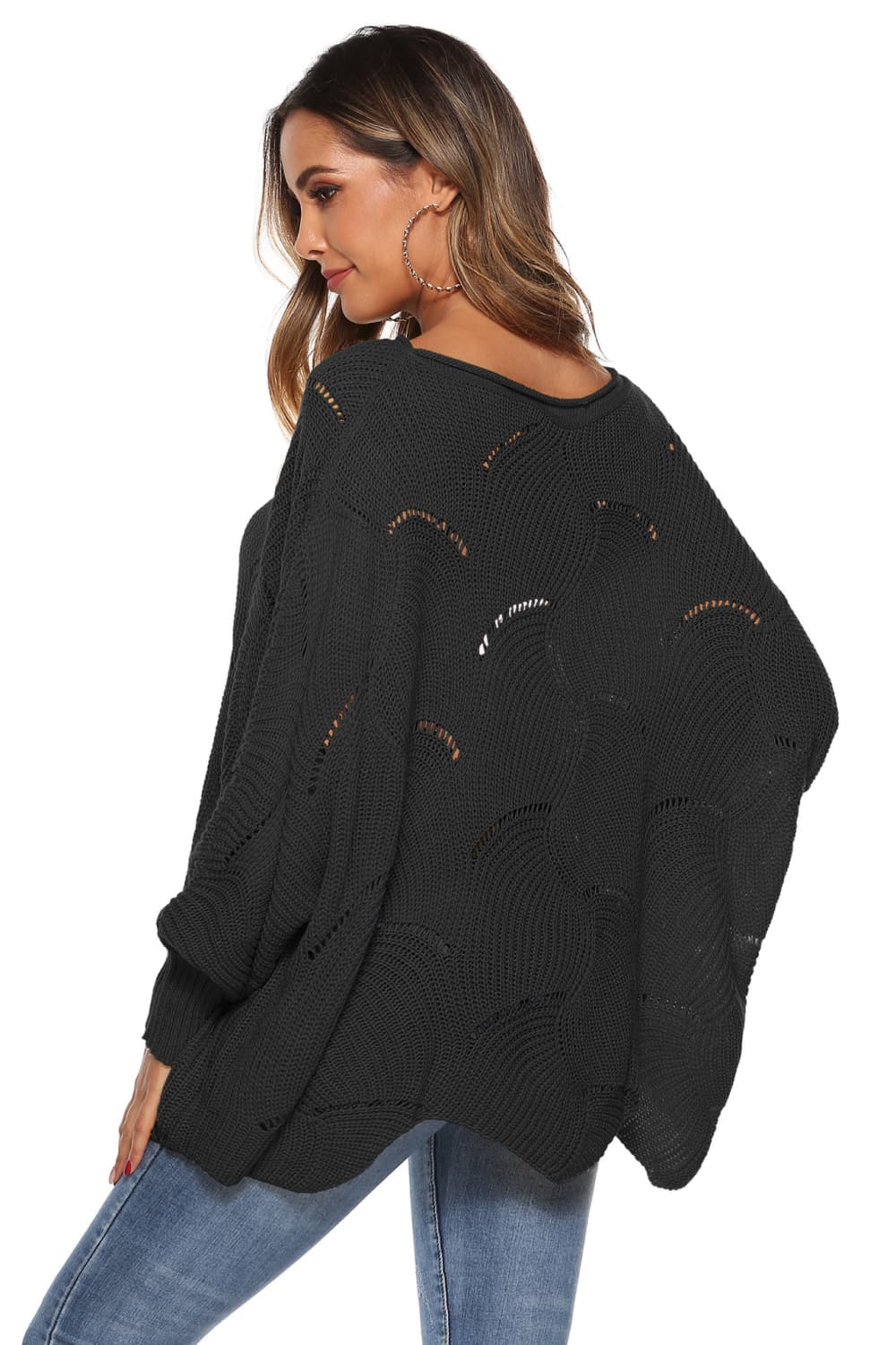 Black openwork cocoon sleeve knit sweater with boat neck and relaxed fit.