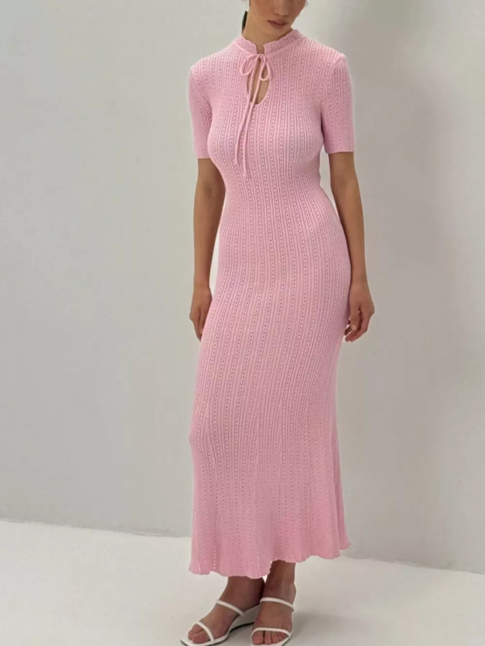 Blush pink knitted mermaid dress with short sleeves and tied neckline