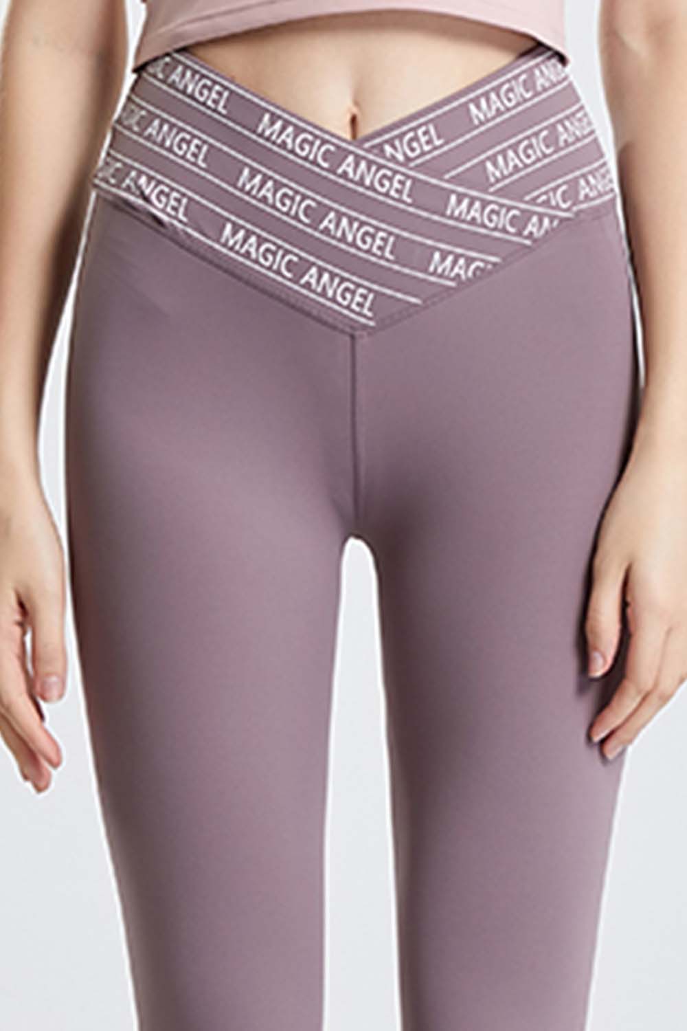 Mauve Angel Band active leggings with a V-waistband and repeating logo detail.