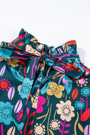 Botanical ruffle-sleeve tie-neck blouse in floral print with a self-tie bow detail.