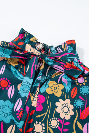 Botanical ruffle-sleeve tie-neck blouse in floral print with a self-tie bow detail.