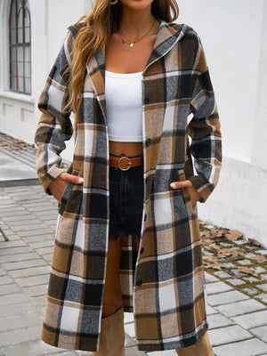 Checked plaid hooded duster coat in brown with button front and pockets.