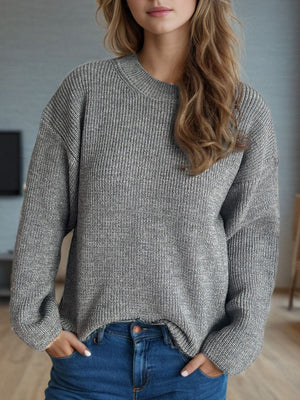 Textured ribbed knit oversized sweater in gray with crew neck and long sleeves.