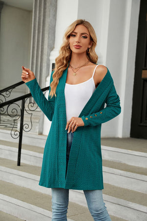 Turquoise textured knit open-front duster cardigan with button detail on sleeves.