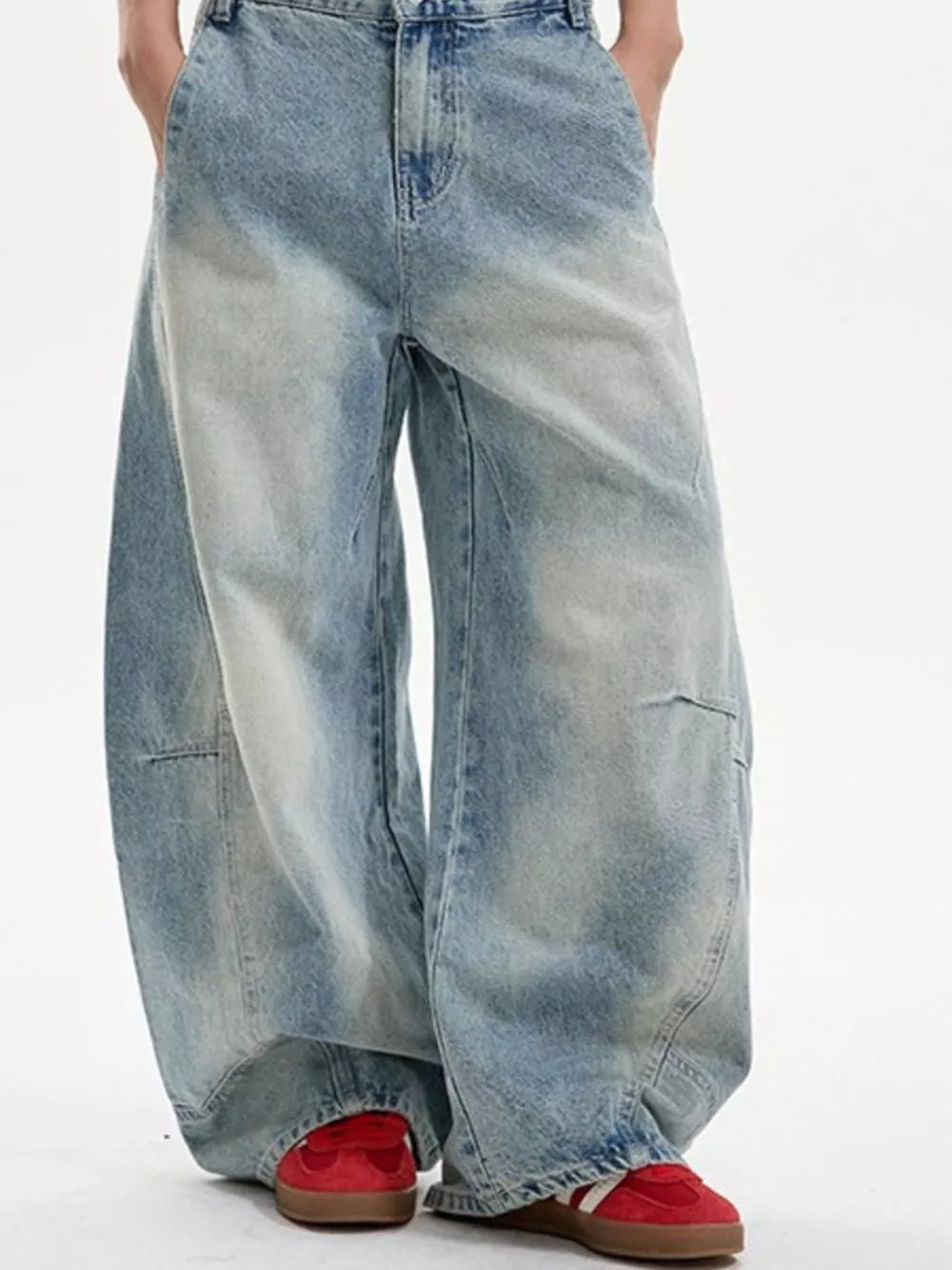 Men's light wash wide-leg jeans with a classic denim look and relaxed fit.