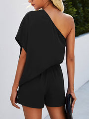 Black asymmetric drape playsuit with elastic waist and short legs