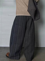 Men's plus size wide leg trousers in black gray with vertical stripes and drawstring detail.