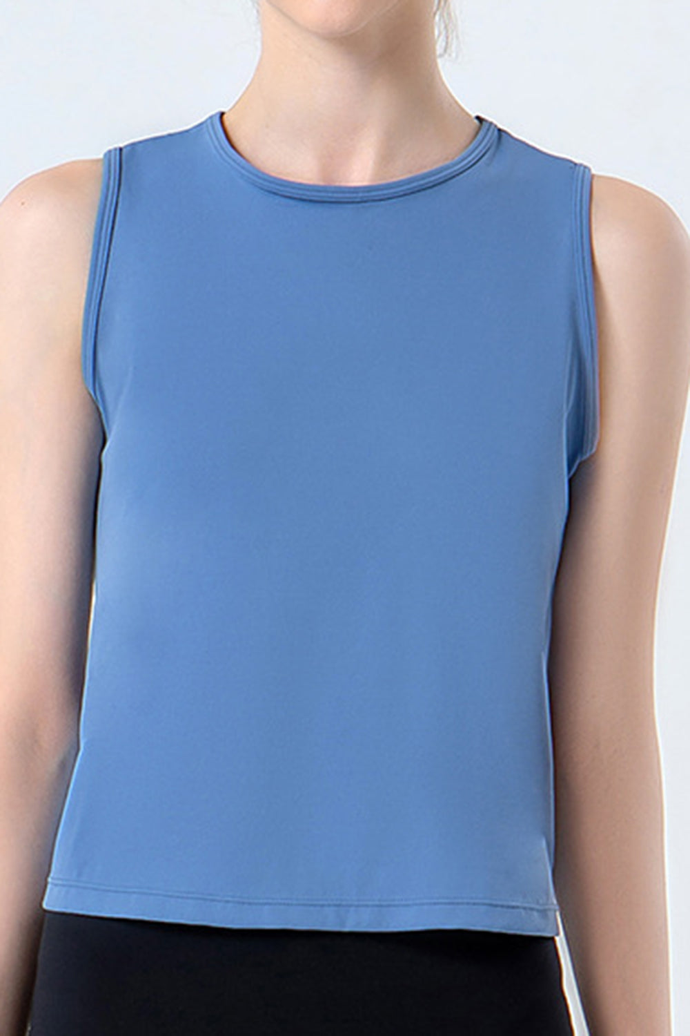 Sculpted Performance Tank Top in Dusty Blue with a round neckline and sleeveless cut.