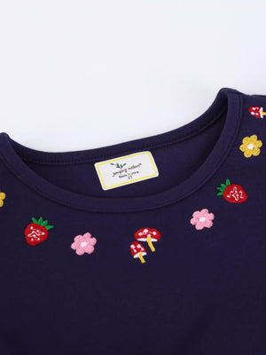 Dark navy baby dress with embroidered strawberries, mushrooms, and flowers.