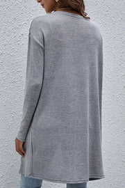 Gray drape-front slouch cardigan with long sleeves and a relaxed fit.