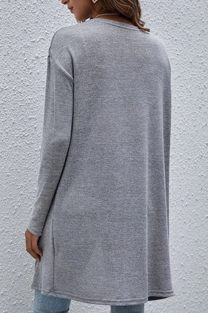 Gray drape-front slouch cardigan with long sleeves and a relaxed fit.