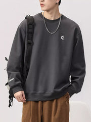 Dark Gray plus-size sweatshirt with round neck, embroidered logo and text detail on sleeve.
