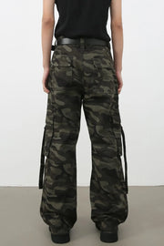 Wide-leg camo cargo pants with belt detail and multiple pockets.