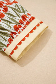 Cotton mini dress with vibrant tulip print and scalloped trim detail