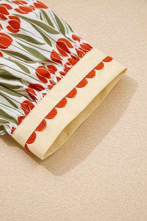 Cotton mini dress with vibrant tulip print and scalloped trim detail