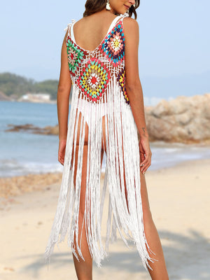 Crochet patchwork cover-up dress with multicolor squares and long white fringe.