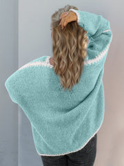 Oversized knit cardigan in Tiffany Blue with white contrast stitching detail.
