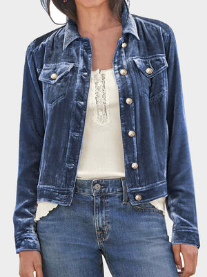 Velvet jacket in navy with silver buttons and chest pockets.