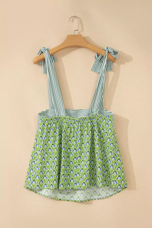 Floral tie-strap tank top with square neckline and green stripe straps.