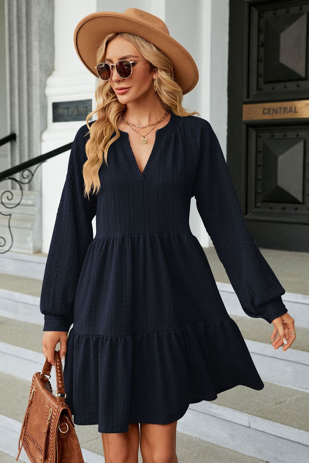 Dark Blue textured babydoll mini dress with voluminous sleeves and tiered hem.