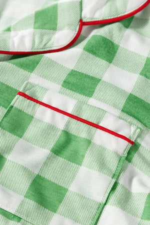 Light green gingham pajama set with red trim detail on collar and pocket.