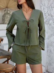 Linen tie-front top and shorts set in Matcha Green with V-neck and long sleeves.