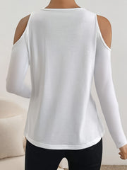 White cold shoulder knit top with long sleeves and lace insets.