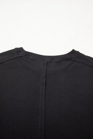 Black maternity t-shirt with lace detail and relaxed fit, featuring a seam detail on the back.